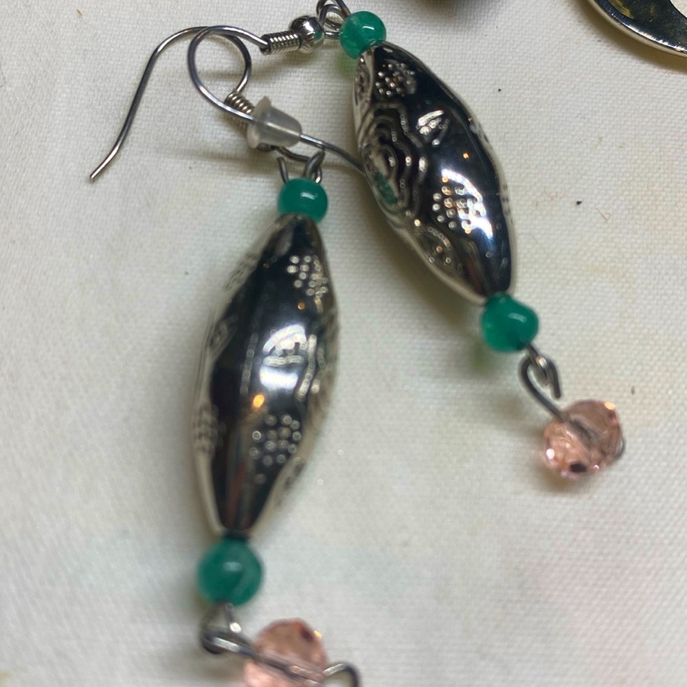 EARRINGS , SILVERY TONE.